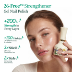 Apuree 26-Free strengthening gel nail polish, model holding bottle, highlighting stronger nails and clean beauty formula