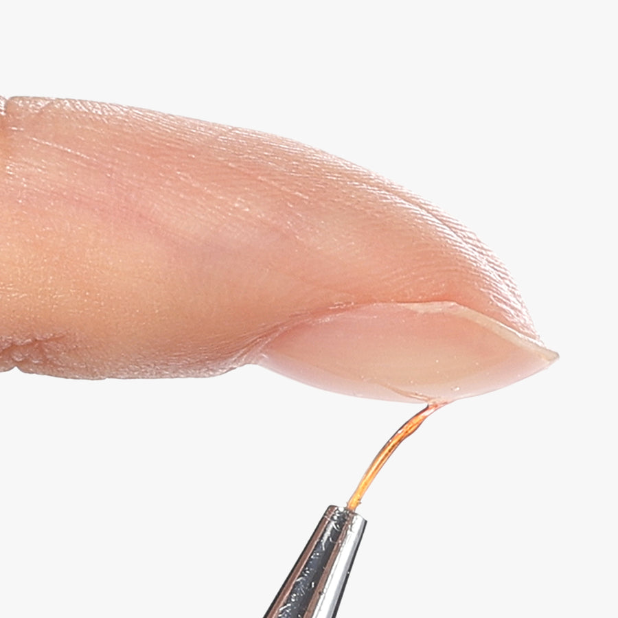 Balancing-the-nail-apex-with-a-detail-brush